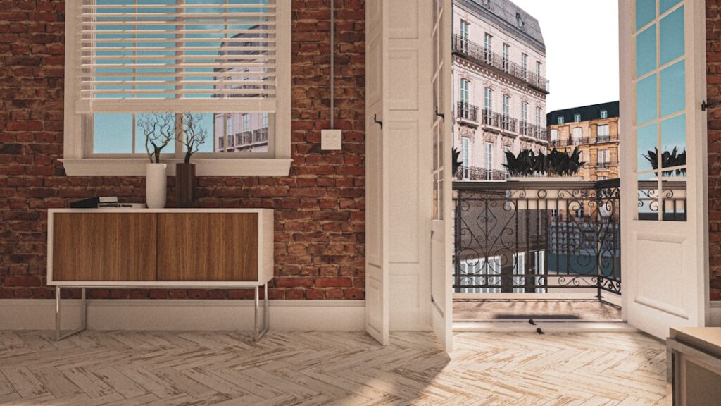 Modern apartment balcony with stylish interlocking deck tiles and outdoor furniture