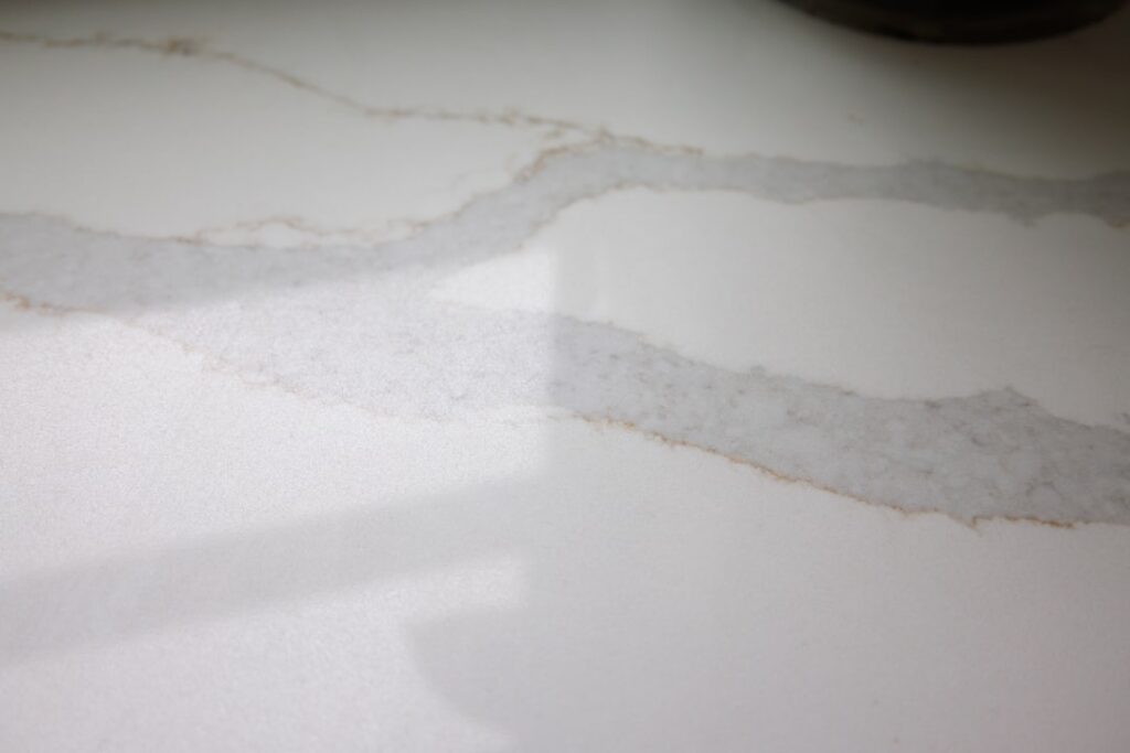 Modern bathroom with a white quartz countertop on a floating vanity