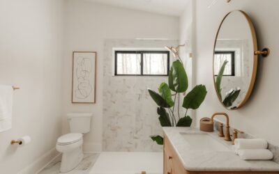 Lush green pothos and fern plants on a bathroom shelf near a window