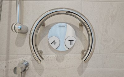Beautiful tiled bathroom shower with mosaic floor
