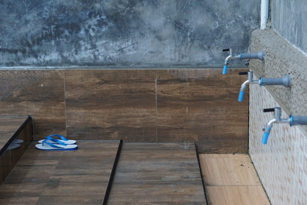 Modern kitchen with waterproof vinyl plank flooring and a center island