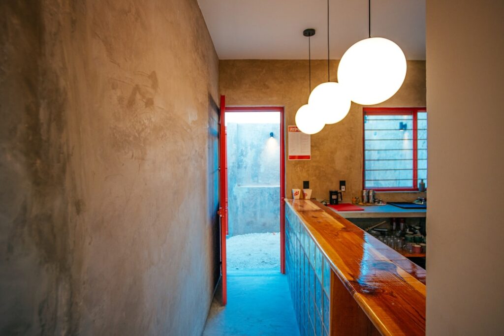 Waterproof laminate flooring installed in a modern kitchen with water-resistant sealed edges