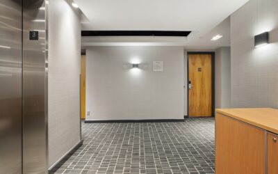 Commercial carpet tiles in a modern office space with geometric pattern design