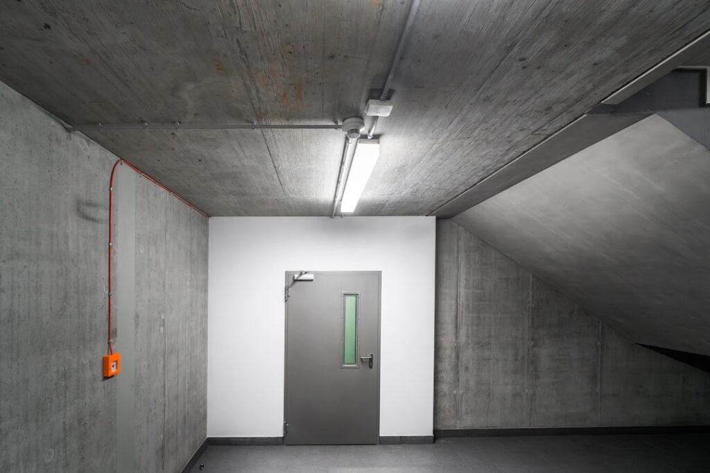 Freshly painted gray concrete garage floor with epoxy coating
