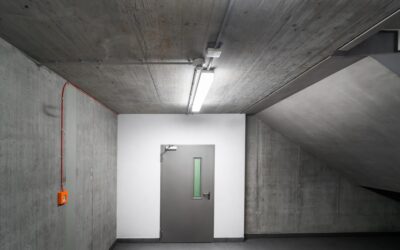 Freshly painted gray concrete garage floor with epoxy coating