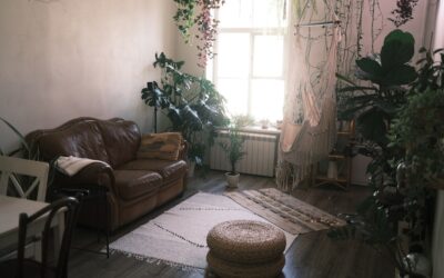 Modern HEPA air purifier running in a bright dust-free living room