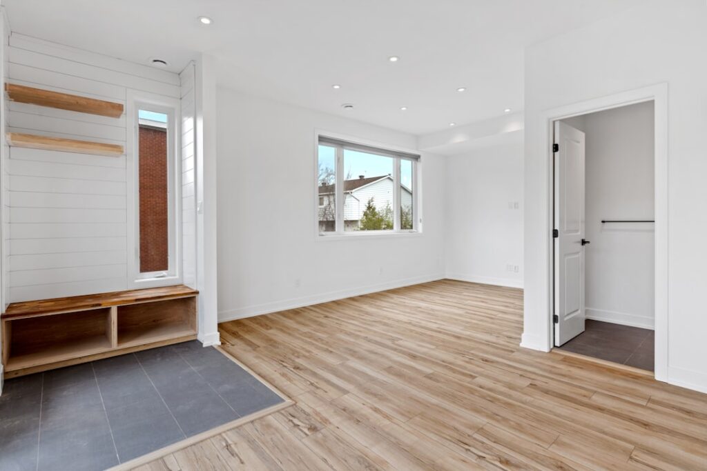 Close-up of laminate flooring planks showing realistic wood grain texture and click-lock edges