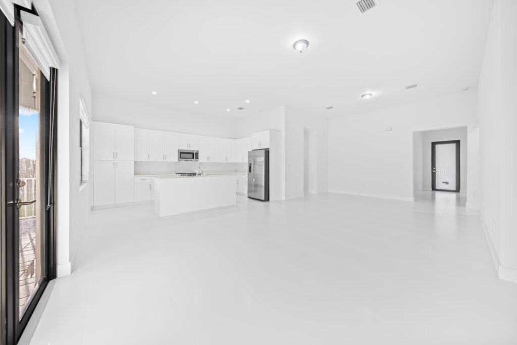 Modern finished basement with luxury vinyl plank flooring and comfortable furniture