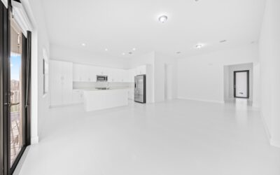 Modern finished basement with luxury vinyl plank flooring and comfortable furniture