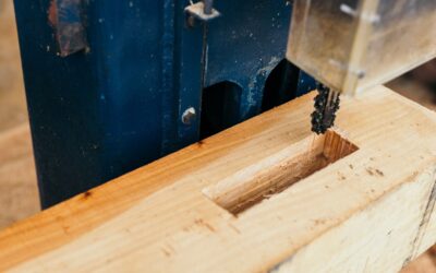 Assortment of flooring screws on a plywood subfloor during installation
