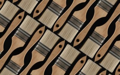 Applying vinyl flooring adhesive to a subfloor with a notched trowel