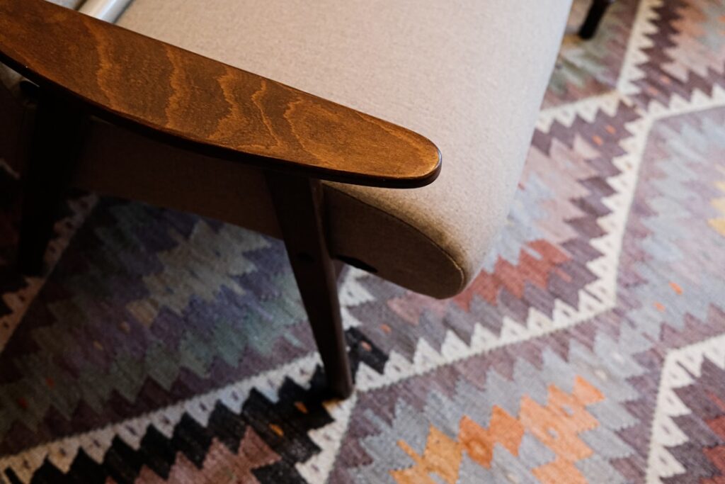 Carpet tiles being installed in a quarter-turn pattern