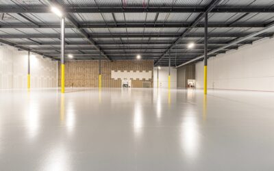 Glossy polished concrete floor in a modern open-plan living area