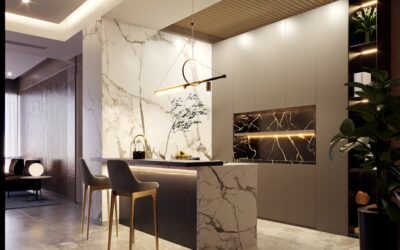A modern kitchen with pendant lights hanging over an island and recessed ceiling lights illuminating countertops