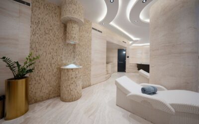 Modern bathroom with wood-look laminate flooring and white fixtures