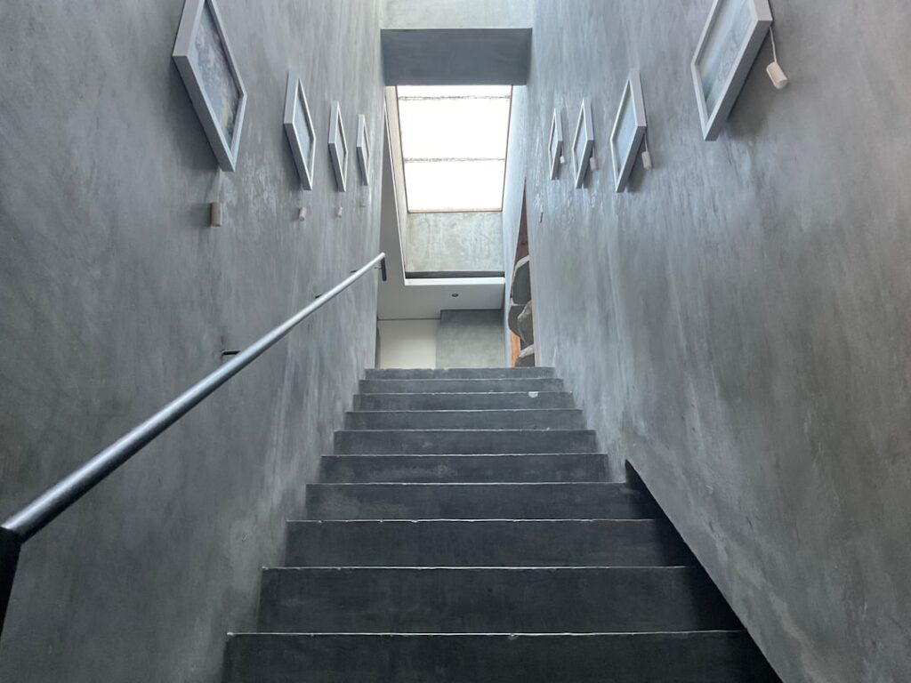 Laminate flooring installed on a staircase with matching stair nosing and risers
