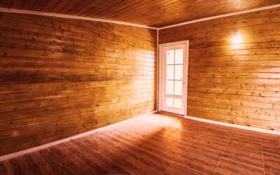 Light oak flooring in a bright modern living room with natural sunlight