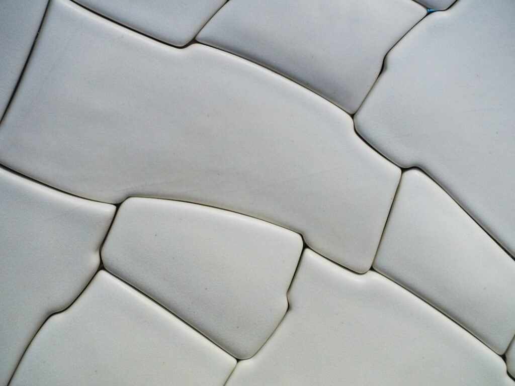 Large format marble look porcelain tiles in a luxury bathroom