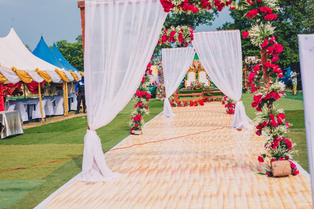Decorated marquee tent with finished flooring for a wedding event