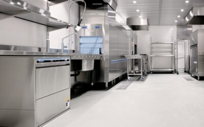 Glossy metallic epoxy floor with swirling silver and blue patterns in a modern room