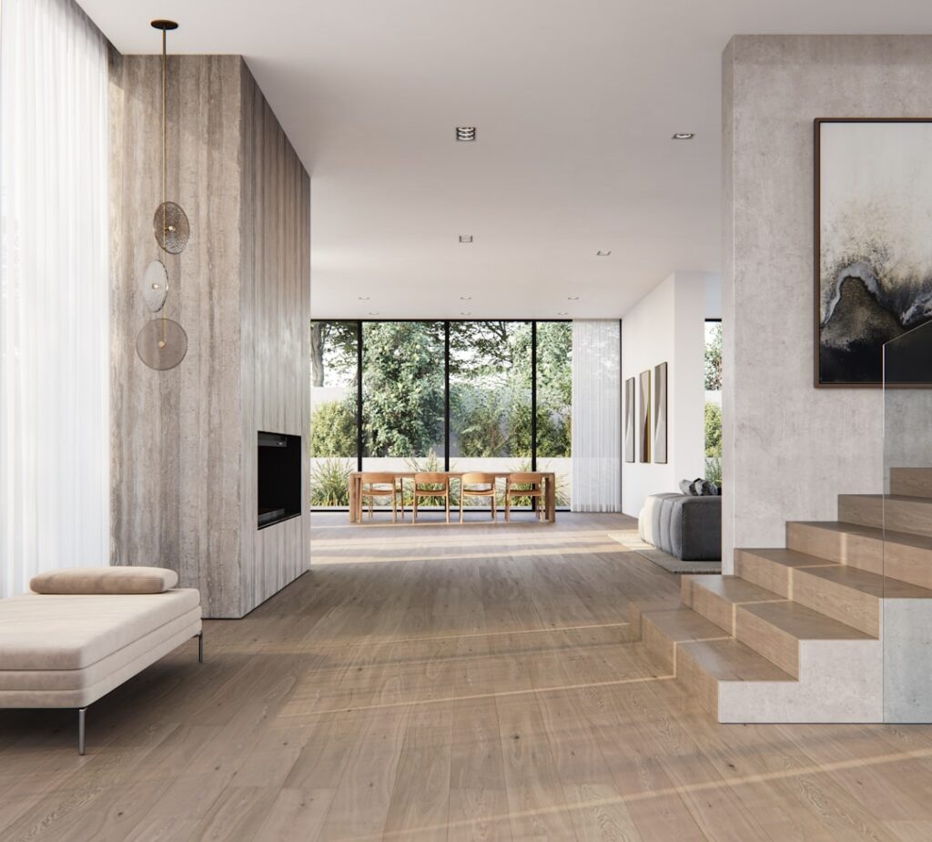 Quick-Step laminate flooring with natural wood-look finish in a contemporary room