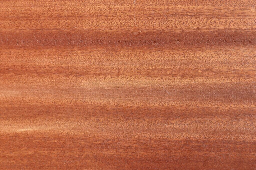 Red oak hardwood flooring with warm tones in a traditional living room