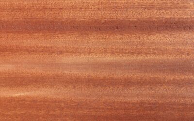 Red oak hardwood flooring with warm tones in a traditional living room