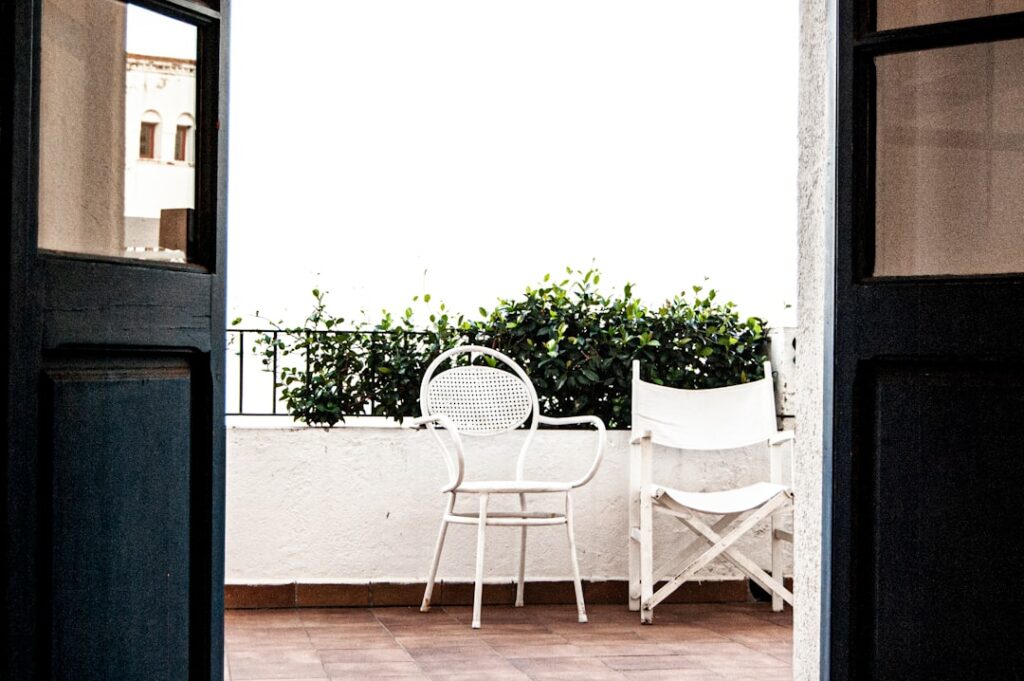 Modern terrace with stylish outdoor flooring tiles and comfortable seating area
