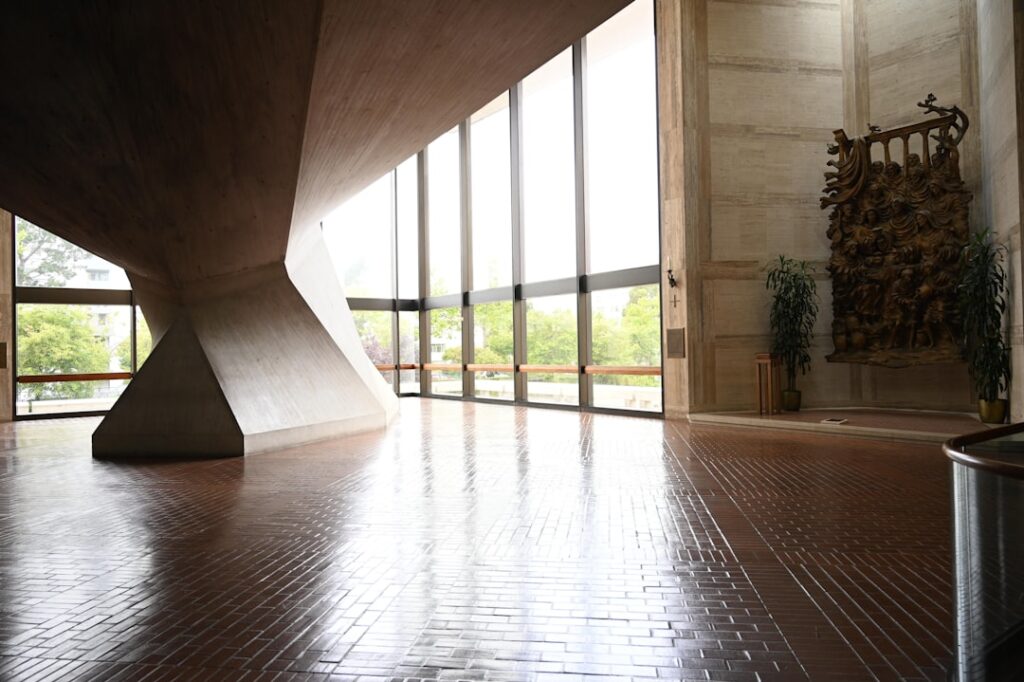 Professional tile installer laying ceramic floor tiles