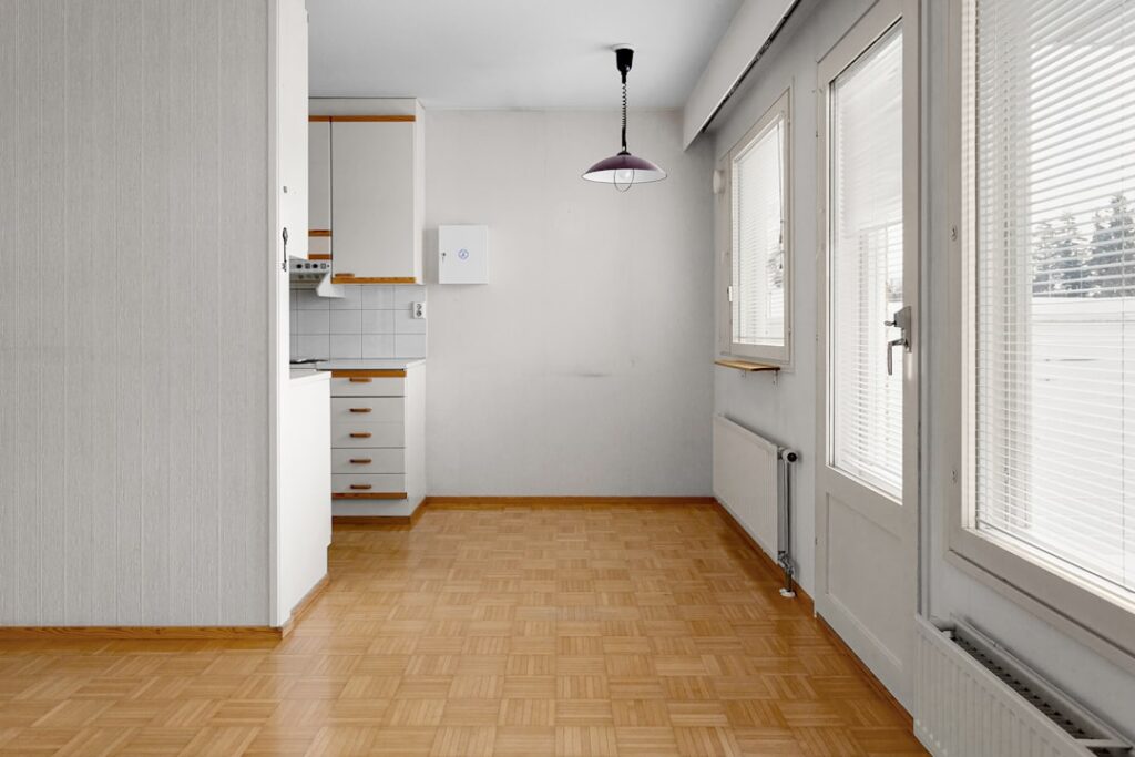 TrafficMaster laminate flooring planks being installed in a home