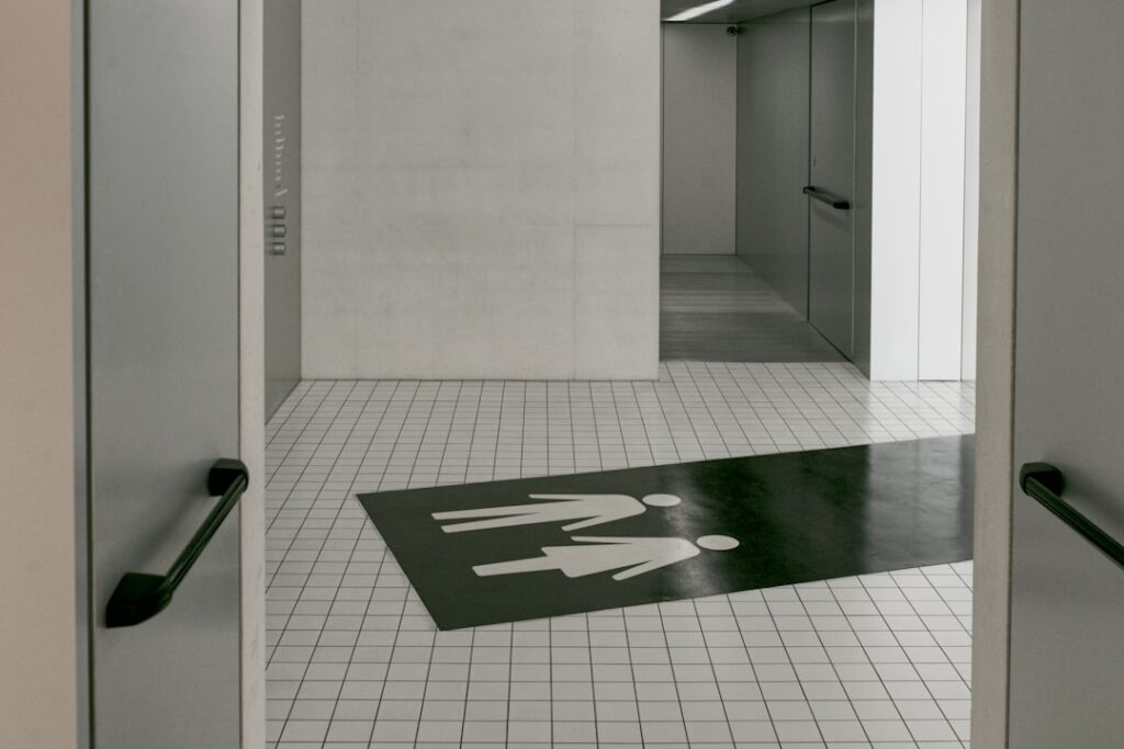 Vinyl plank flooring installed in a modern bathroom