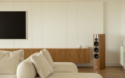 Side-by-side comparison of vinyl plank and engineered hardwood flooring in a living room