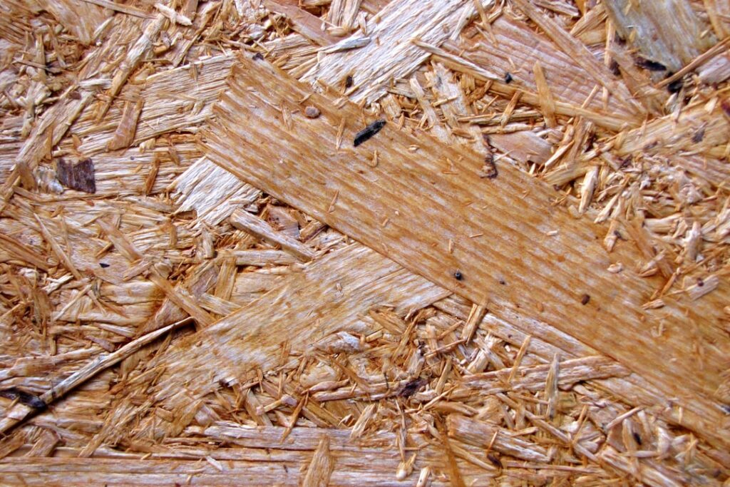Side-by-side comparison of white oak and red oak hardwood floor planks