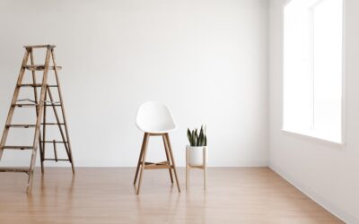 Bright living room with white vinyl plank flooring and natural light