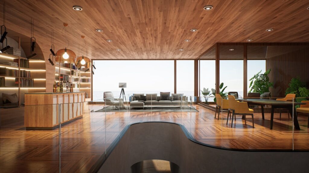 Spacious living room with wide plank laminate flooring in a natural oak finish