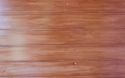 Applying wood floor stain to hardwood with a lambswool applicator