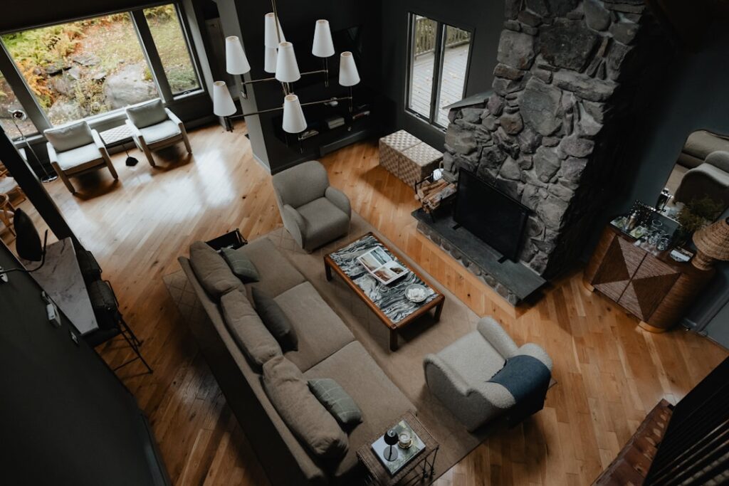 Warm-toned wood laminate flooring in a cozy living room setting