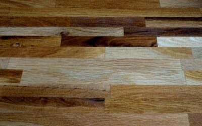 Wood look vinyl plank flooring installed in a bright living room