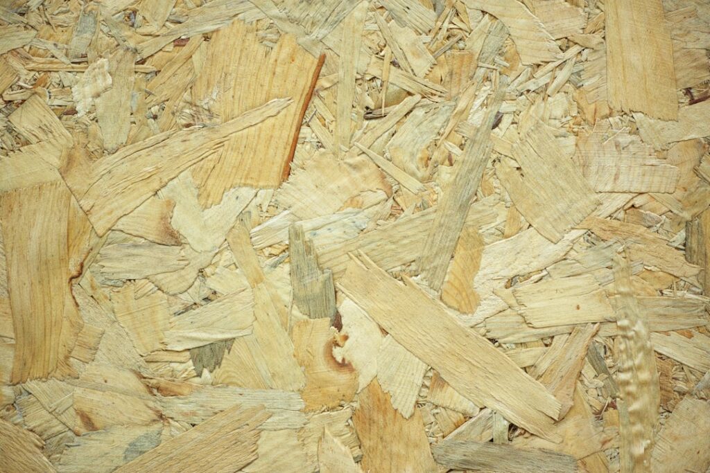 Various wooden flooring samples laid out for price comparison