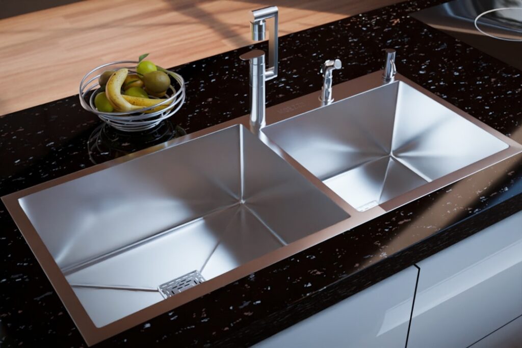 Sleek black kitchen countertops paired with white cabinets in a contemporary kitchen