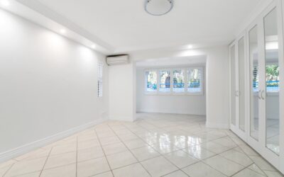 Large format grey porcelain floor tiles in a modern living room