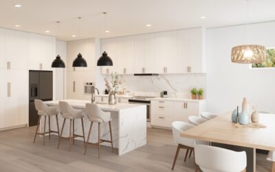 Large kitchen island with quartz waterfall edge countertop and pendant lighting