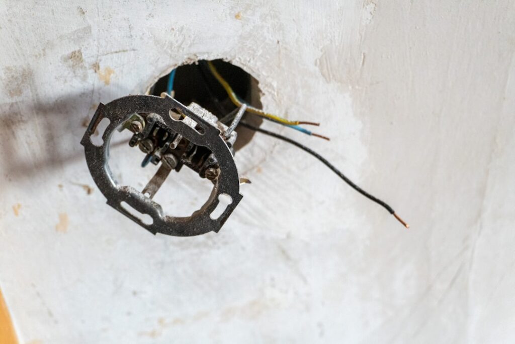 Standard electrical outlet installed at proper height from finished floor