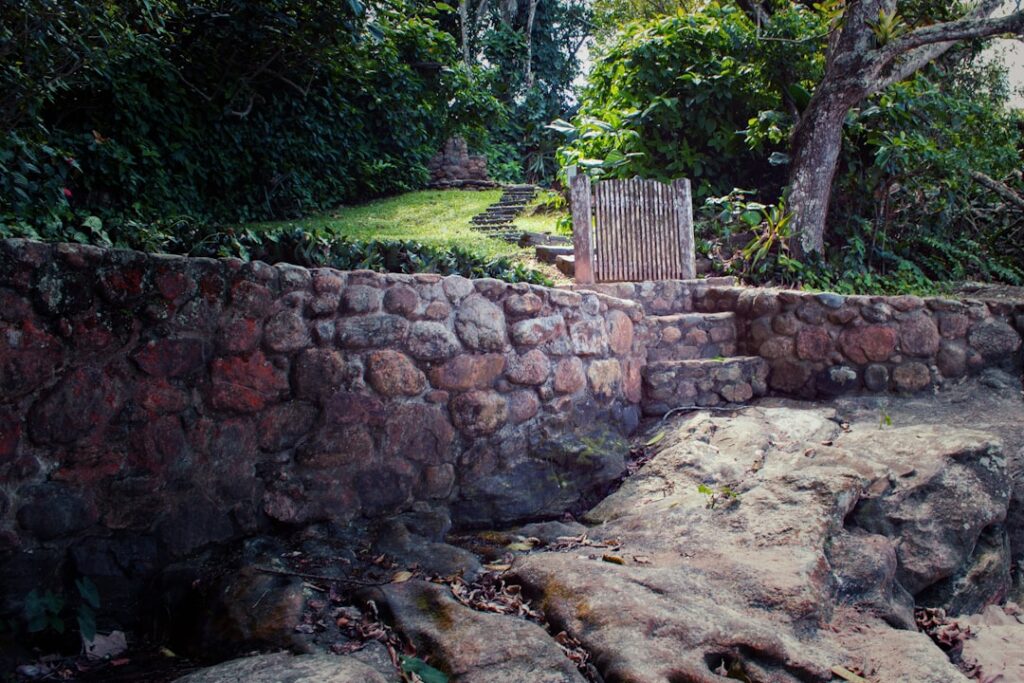 Sloped Yard Natural Rock Retaining Wall Ideas