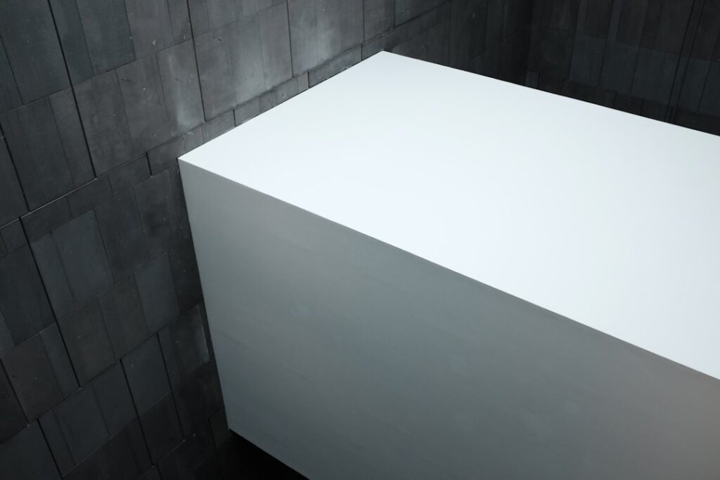 Walk-In Shower With a Half Wall and Bench