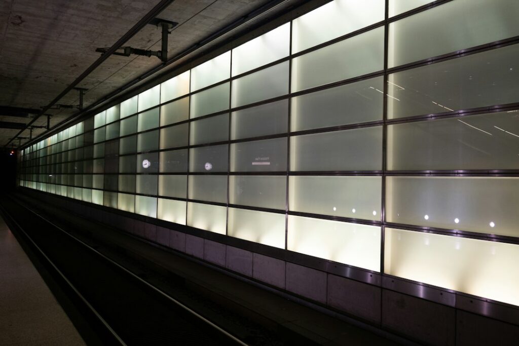Acoustically Transparent Screen: Speakers Behind the Picture